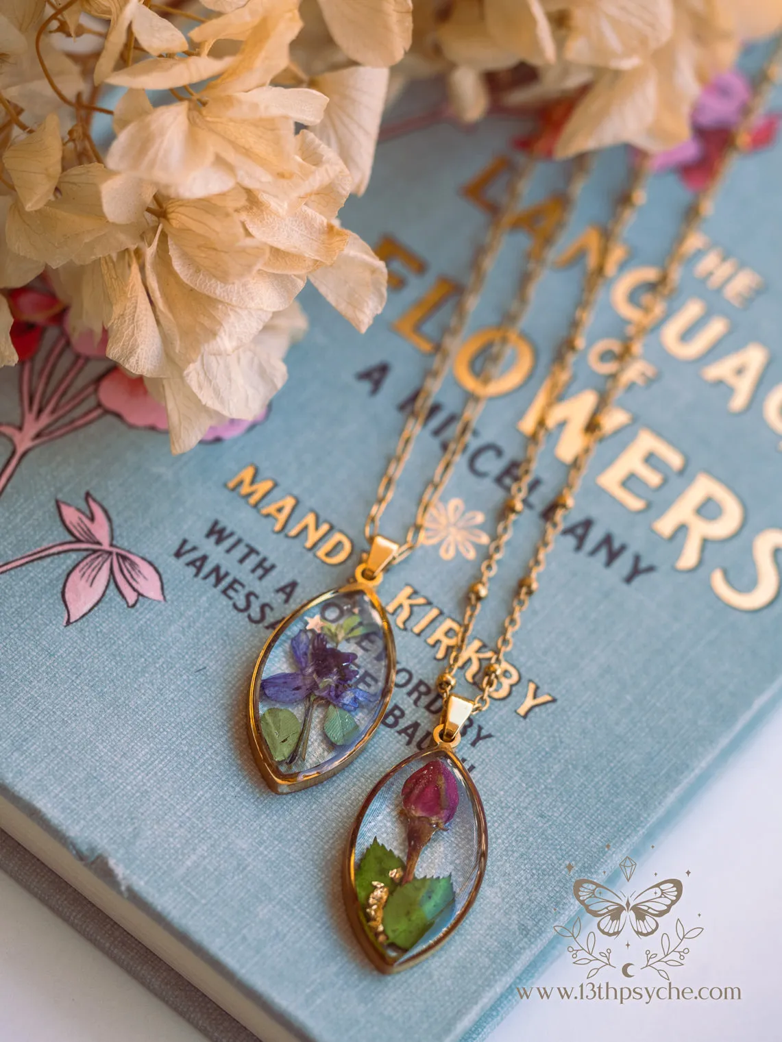 Blue pressed flower resin pendant necklace