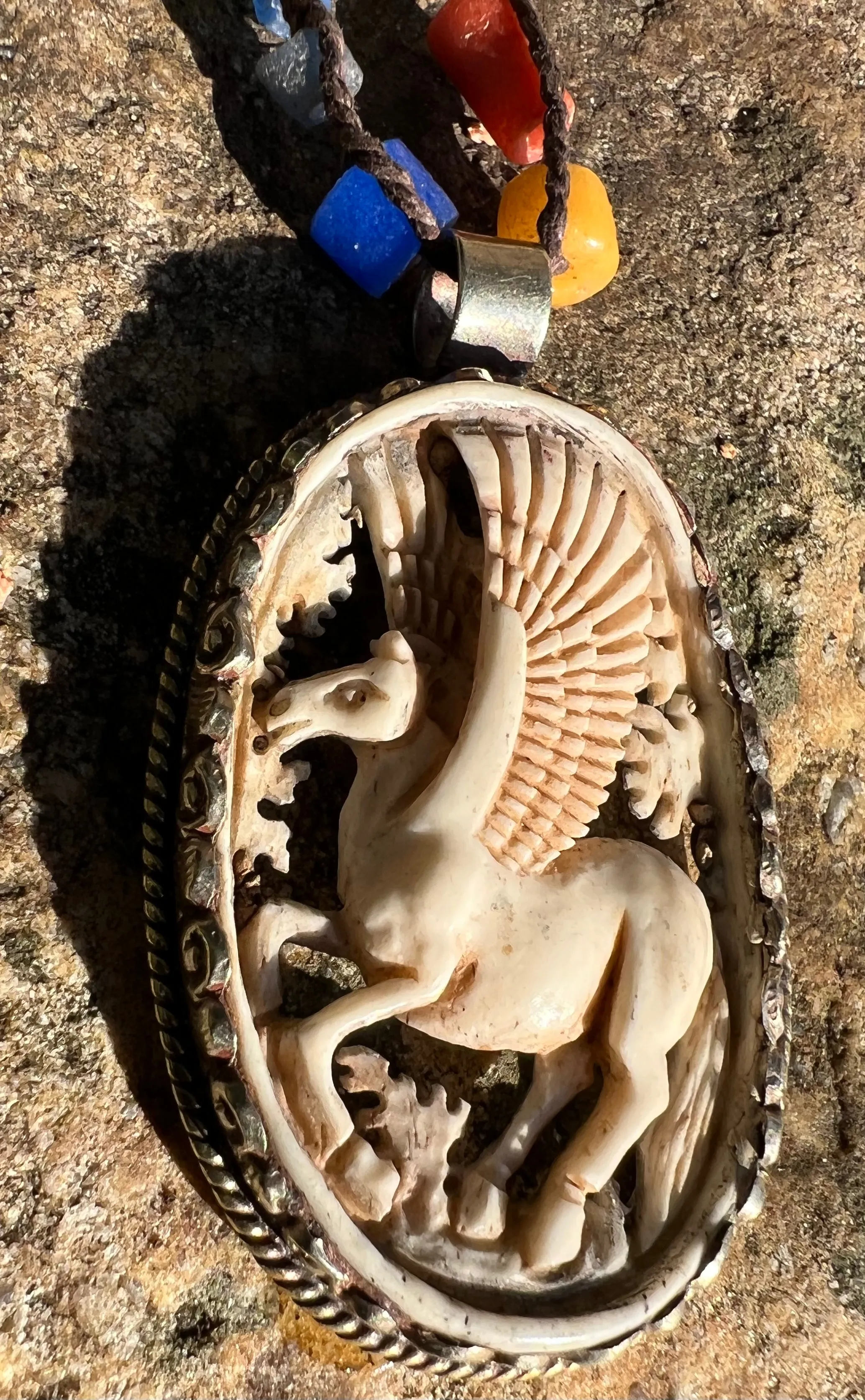 Carved Open Bone Unicorn Necklace in Silver Casing with African Glass Beads