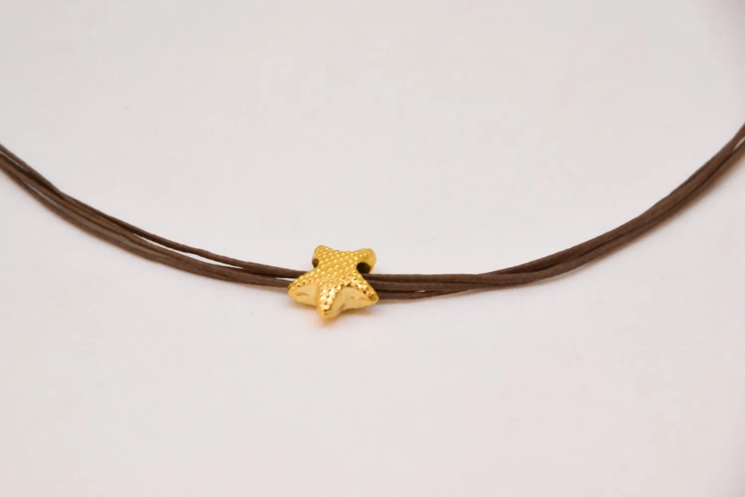 Gold starfish necklace, brown cord, gift for her, nautical jewelry