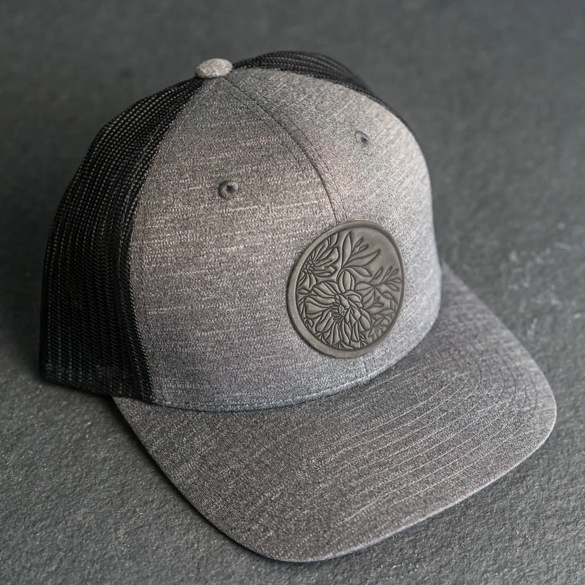 Leather Patch Performance Style Trucker Hat - Circle Patch - Floral Stamp