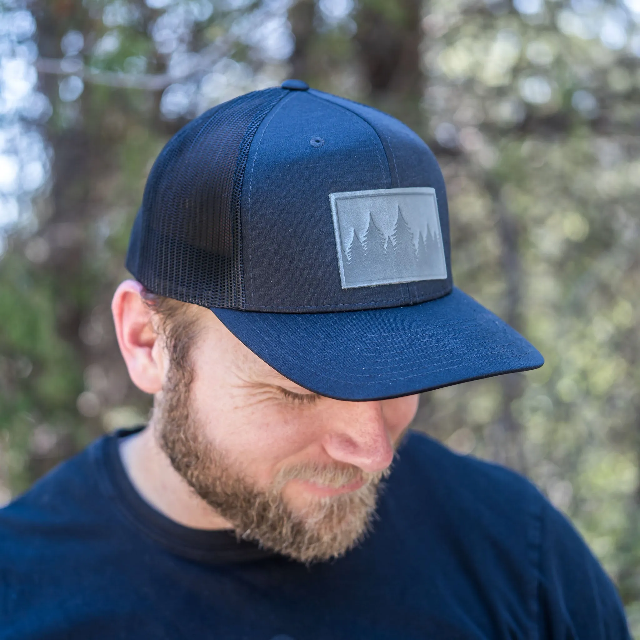 Leather Patch Performance Style Trucker Hat - Pine Tree Ridgeline Stamp