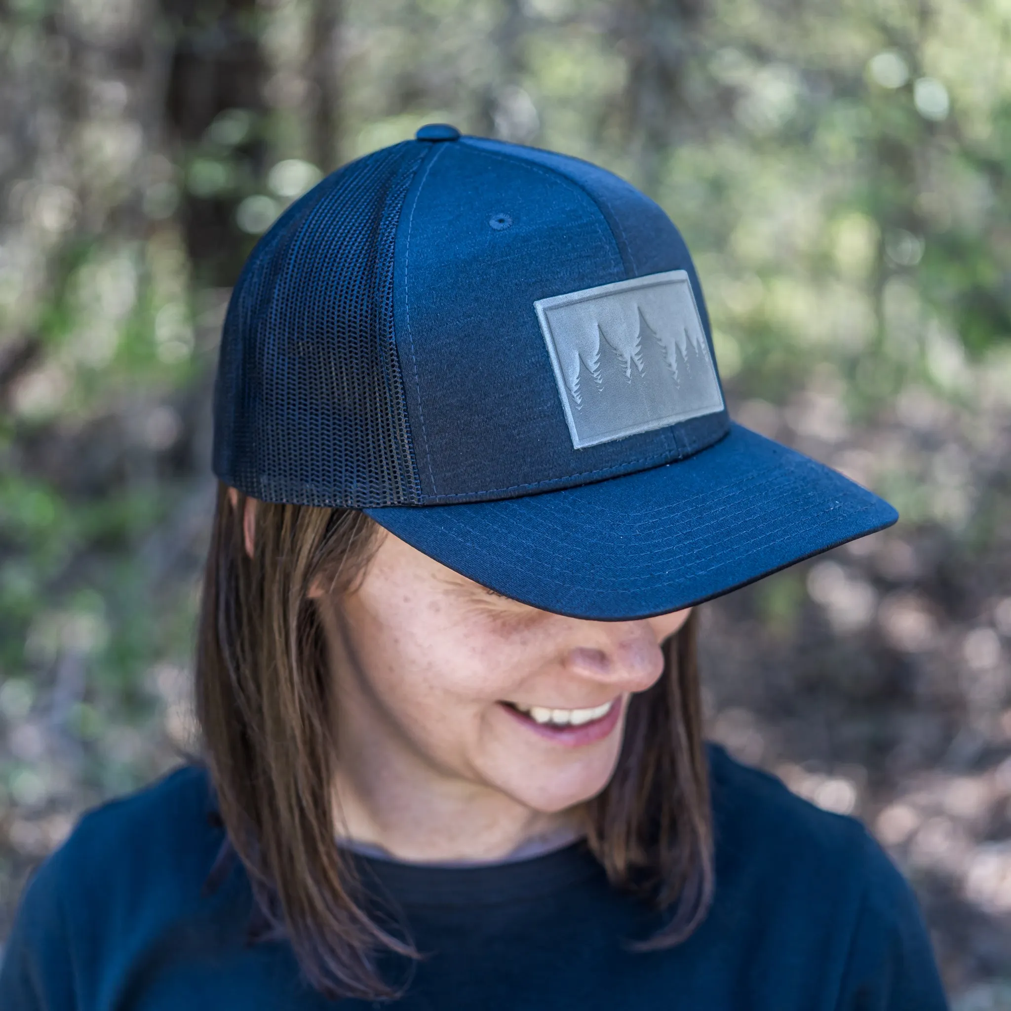 Leather Patch Performance Style Trucker Hat - Pine Tree Ridgeline Stamp