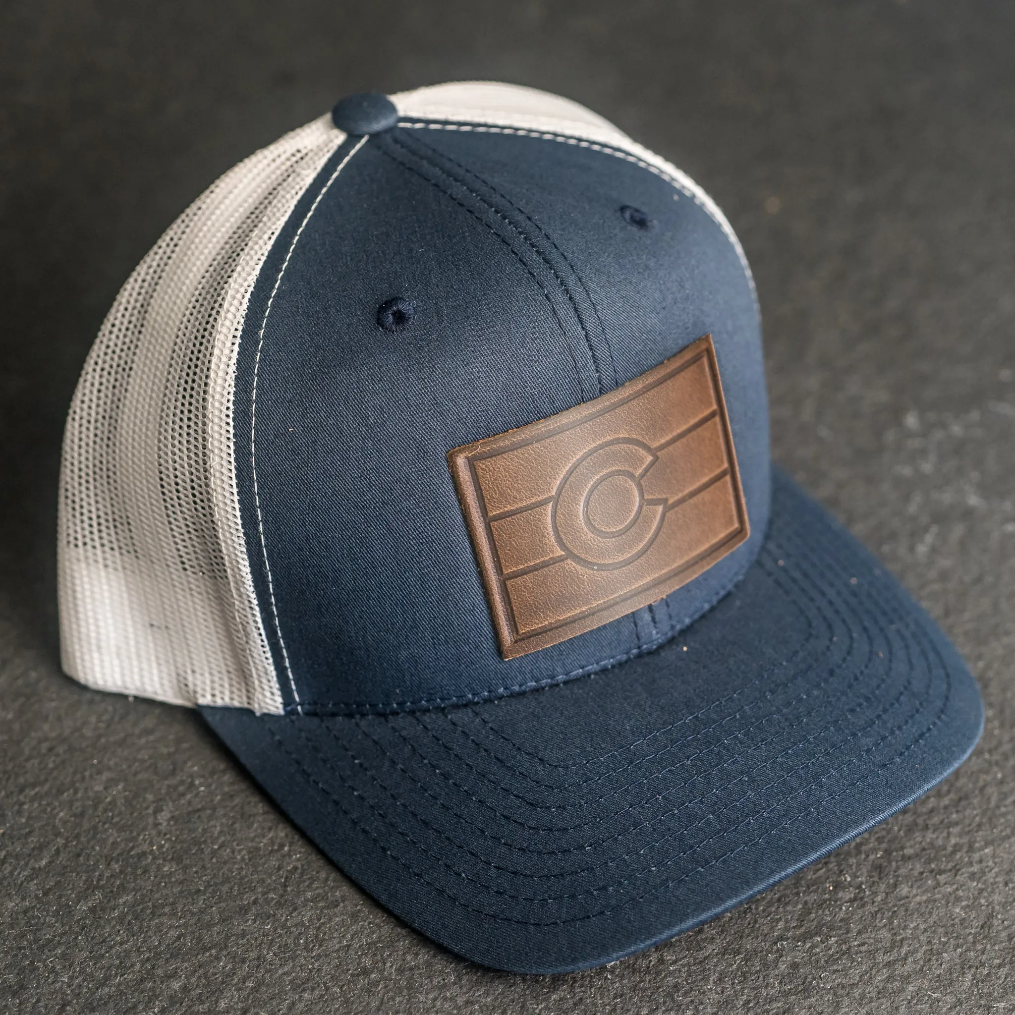 Leather Patch Trucker Style Hat - Colorado Flag Stamp